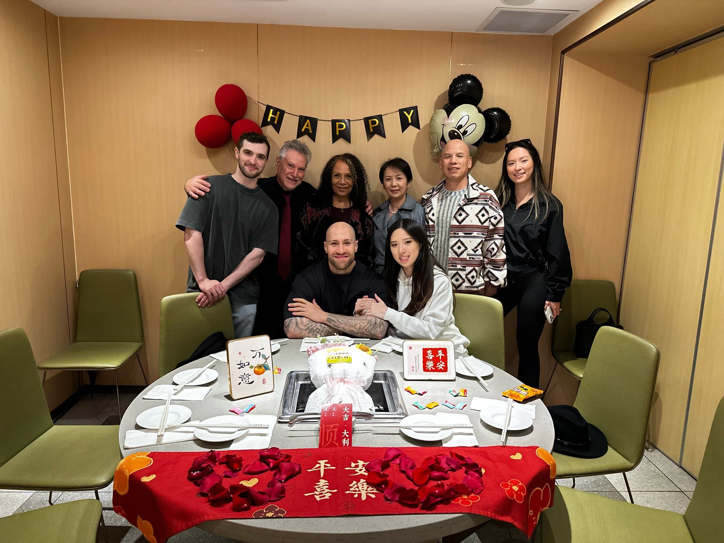 Spencer and Nancy with her family at a birthday celebration